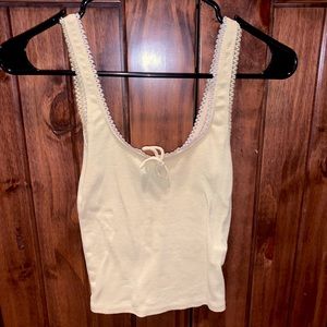 Women’s yellow tank crop top.